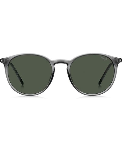 HUGO Graue Sonnenbrille mit abgerundeten Metallbügeln - Grün