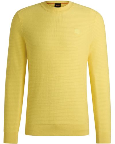 BOSS Regular-Fit Pullover aus Baumwolle mit Kaschmir-Anteil und Logo-Aufnäher - Gelb