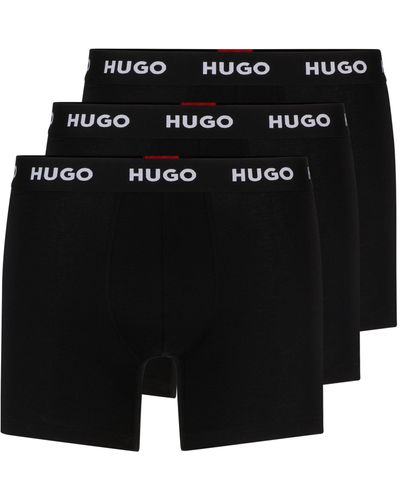 HUGO Dreier-Pack eng anliegende längere Boxershorts aus Stretch-Baumwolle mit Logos am Bund - Schwarz