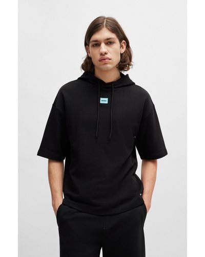 HUGO Short-sleeved Relaxed-fit Hoodie In Cotton Terry - Black