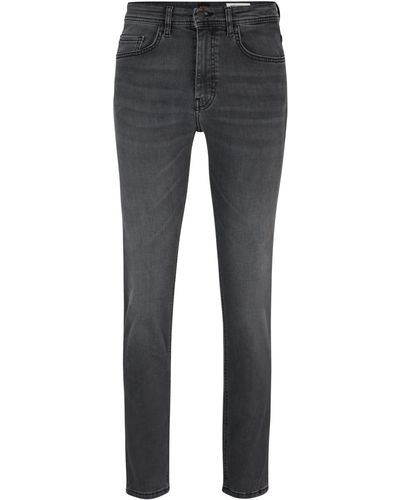 BOSS by HUGO BOSS Schwarze Tapered-Fit Jeans aus gewaschenem Super-Stretch-Denim - Blau