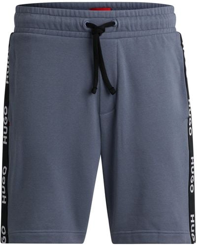HUGO Shorts aus Baumwoll-Terry mit Logo-Stickereien und Tunnelzugbund - Blau