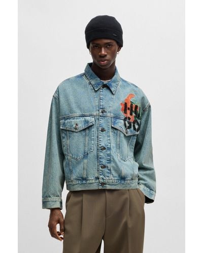 HUGO Regular-fit Jacket In Rigid Denim With Logo Prints - Blue