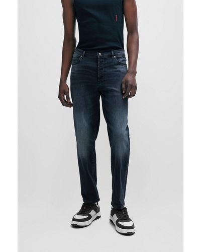 HUGO Jeans con fit affusolato in denim elasticizzato blu