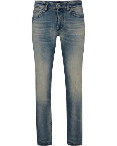 BOSS Slim-Fit Jeans aus blauem Denim mit Beigestich