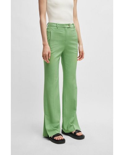 BOSS Pantalones slim fit de material elástico con pernera acampanada - Verde