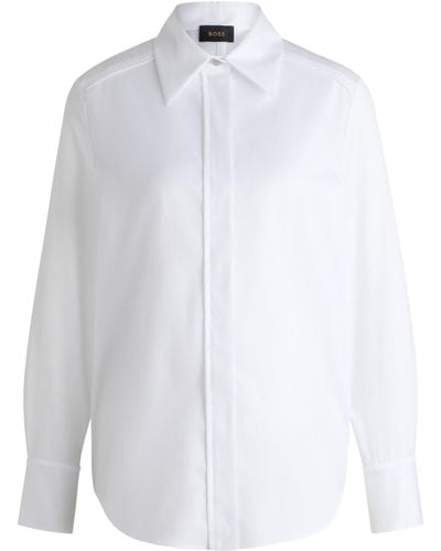 BOSS Bluse aus gestreifter Baumwolle mit verdeckter Knopfleiste - Weiß