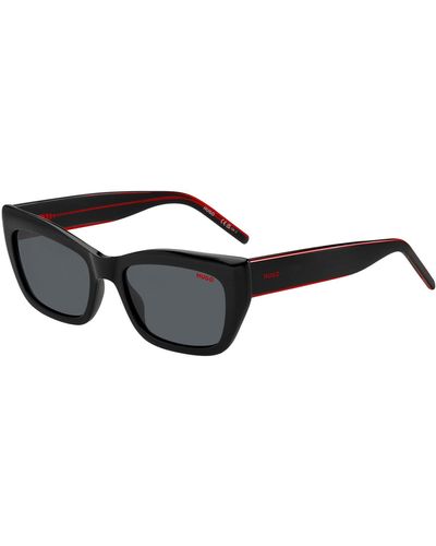 HUGO Occhiali da sole in acetato nero con aste effetto a strati nel rosso tipico del marchio