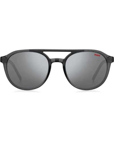 HUGO Sonnenbrille aus grauem Acetat mit Doppelsteg und gemusterten Bügeln
