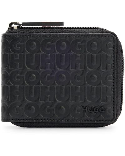 HUGO Geldbörse aus mattem Leder mit umlaufendem Reißverschluss und Stack-Logos - Schwarz