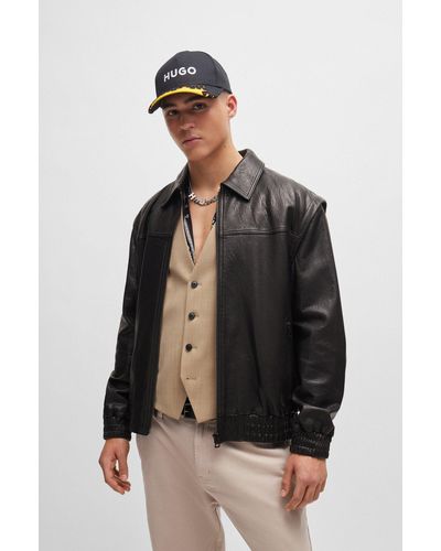 HUGO Leather Jacket With Detachable Sleeves And Stud Artwork - Black