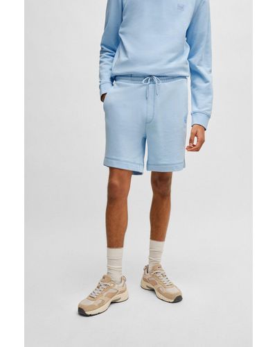 BOSS Shorts regular fit en felpa de algodón con insignia de logo - Azul