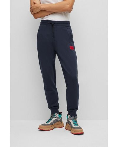 HUGO Cotton-terry Tracksuit Bottoms With Red Logo Label - Blue