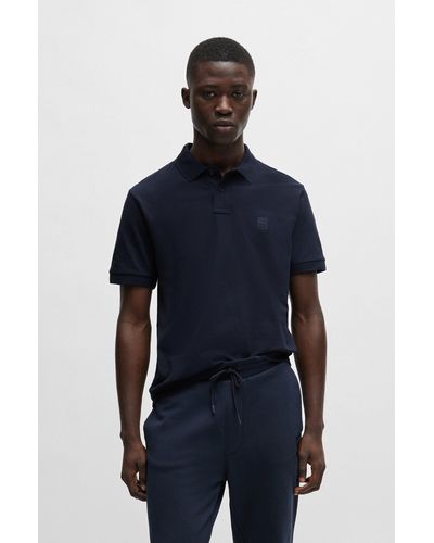 BOSS Polo Slim Fit en coton stretch à patch logo - Bleu