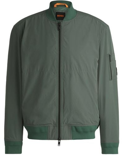 BOSS Wasserabweisende Jacke mit Reißverschlusstasche am Ärmel - Grün