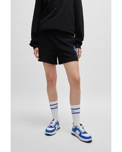 HUGO Shorts in cotone terry con la storia del logo della nuova stagione - Nero