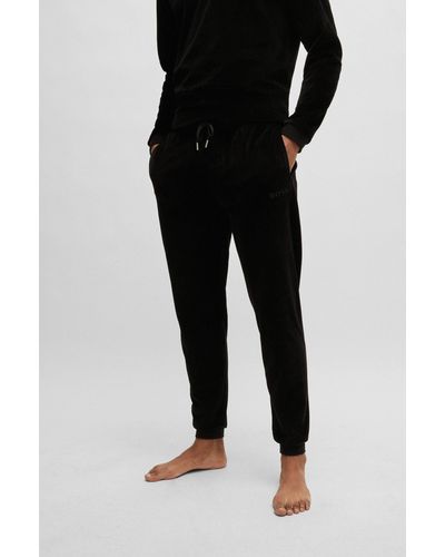 BOSS Pantaloni della tuta in velours di misto cotone con logo ricamato - Nero