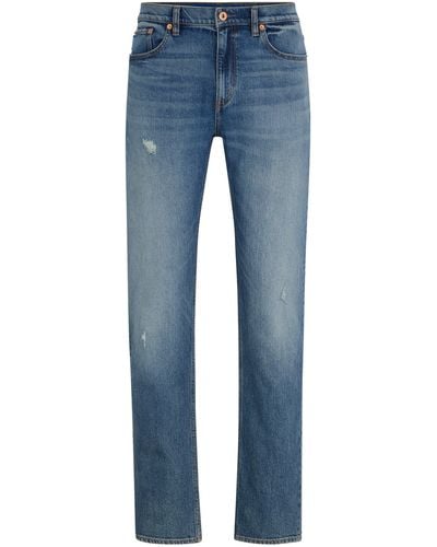 HUGO Slim-Fit Jeans aus mittelblauem Stretch-Denim in Used-Optik