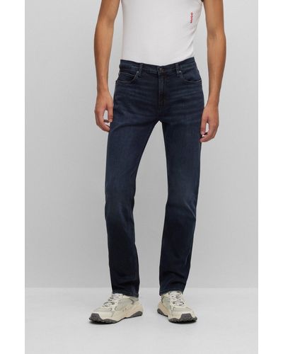 HUGO - Slim-fit jeans in blue-black stretch denim