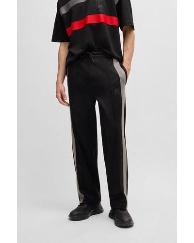 HUGO X Rb Oversized-fit Trousers With Tape And Signature Bull Icon - Black