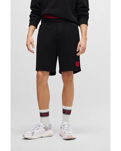 HUGO Shorts regular fit de felpa de algodón con etiqueta con logo - Negro
