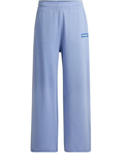 HUGO Relaxed-fit Tracksuit Bottoms With Logo Print - Blue
