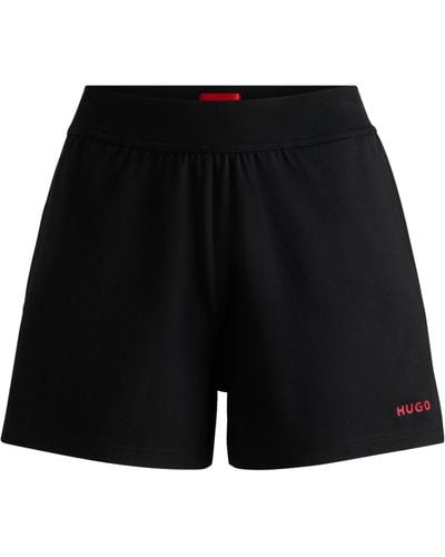 HUGO Relaxed-Fit Shorts mit Logo-Print aus Silikon - Schwarz