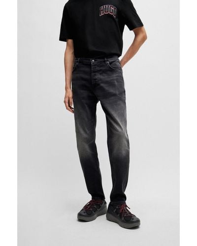 HUGO Tapered-fit Jeans In Black Comfort-stretch Denim - Blue