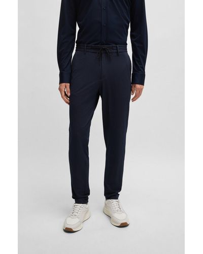 BOSS Pantalon Slim Fit en seersucker stretch performance - Bleu