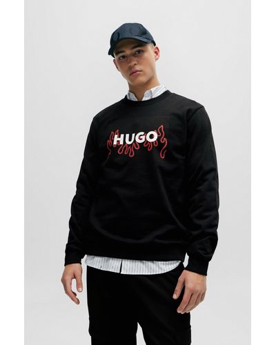 HUGO Sweat Regular Fit en molleton de coton avec logo flamme - Noir