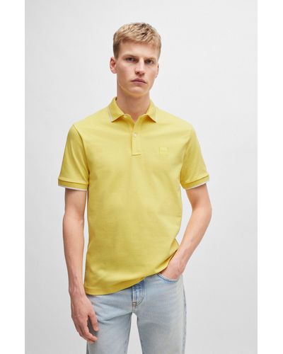 BOSS Slim-fit Polo Shirt In Washed Stretch-cotton Piqu - Yellow