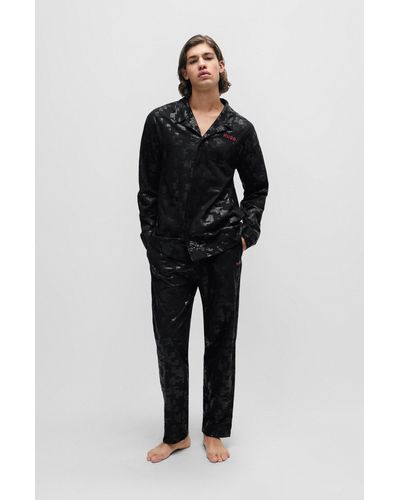 HUGO Pyjama Relaxed Fit en coton stretch avec logos - Noir