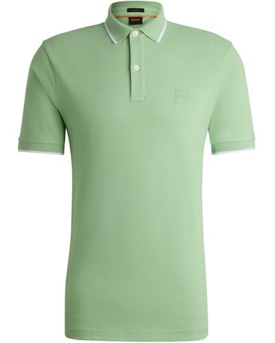 BOSS Slim-Fit Poloshirt aus gewaschenem elastischem Baumwoll-Piqué - Grün