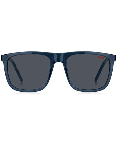 HUGO Sonnenbrille aus blauem Acetat mit gemusterten Bügeln