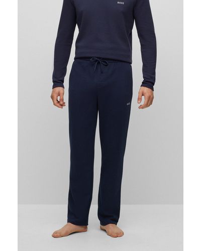 BOSS by HUGO BOSS Pantalones de pijama de algodón con estructura de rejilla y logo bordado - Azul