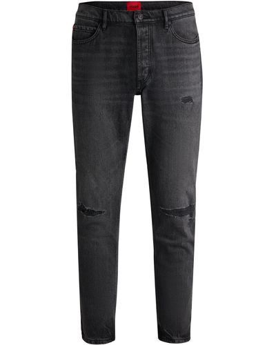 HUGO Tapered-Fit Jeans aus schwarzem Used-Denim