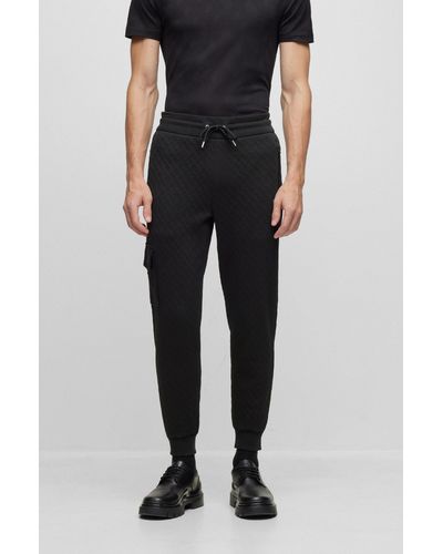 Hugo Boss Cotton-Blend Tracksuit Bottoms with Monogram Pattern- Black | Men's Jogging Pants Size XL