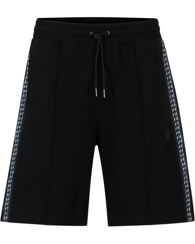 HUGO Relaxed-Fit Shorts aus Stretch-Baumwolle mit Stack-Logo - Schwarz