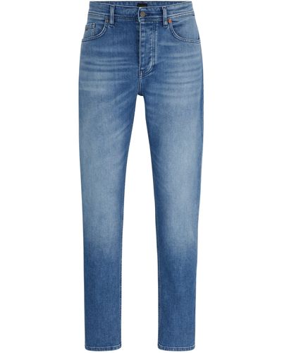BOSS Blaue Tapered-Fit Jeans aus bequemem Stretch-Denim