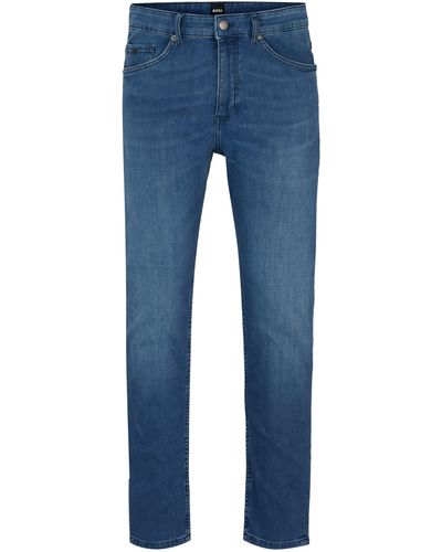 BOSS Blaue Tapered-Fit Jeans aus Stretch-Denim