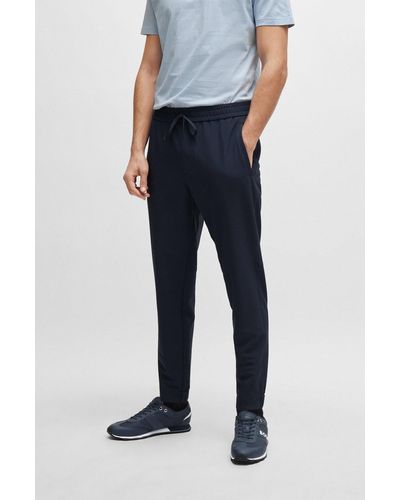 BOSS Tapered-fit Chinos In Easy-iron Four-way Stretch Fabric - Blue
