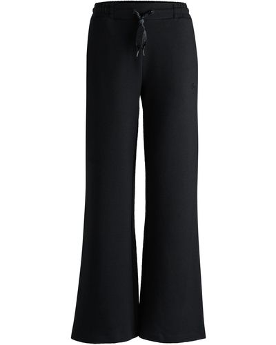 BOSS Tracksuit Bottoms In A Cotton Blend With Piped Details - Black