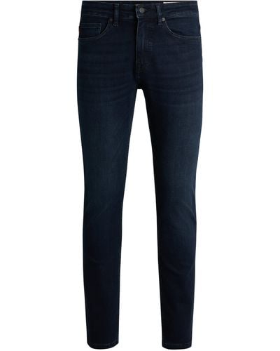 BOSS Delaware Slim-fit Jeans In Blue-black Soft-motion Denim