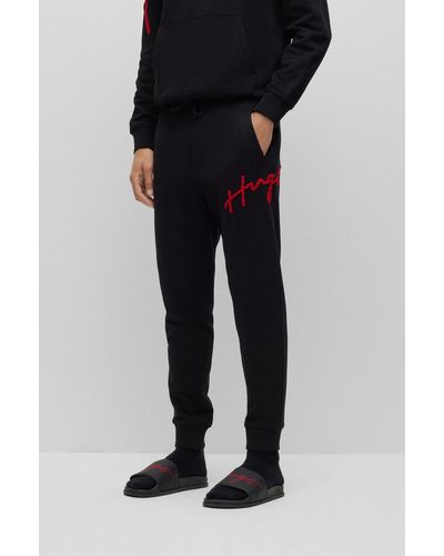 Cotton-terry tracksuit bottoms with fleece logo