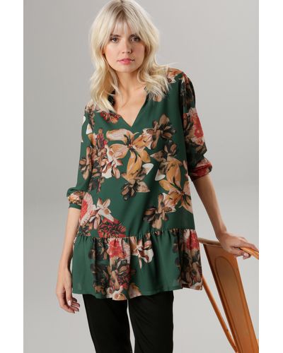 Aniston SELECTED Sommerkleid, in mit Blätterdruck Lyst großflächigem DE Blüten- und | Rot
