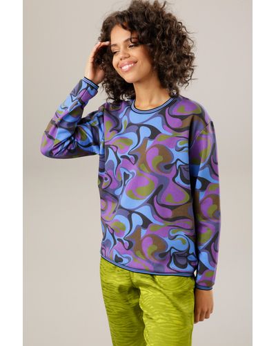 Aniston CASUAL Sweatshirt, mit farbharmonischem, graphischem Druck - Blau