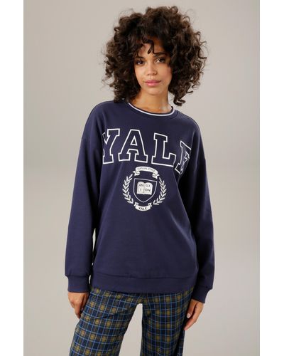 Aniston CASUAL Sweatshirt, mit "YALE"-Schriftzug und Druck im Vorderteil - Blau