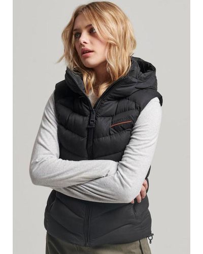 | DE Weste Schwarz Lyst in Superdry