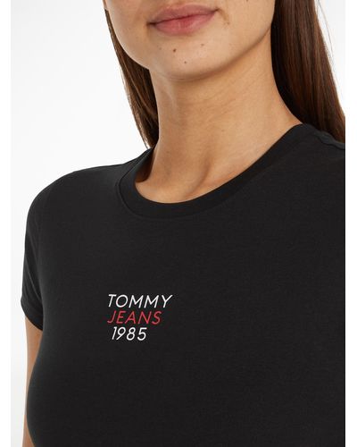 Tommy Hilfiger T-Shirt Slim Essential in Pink mit DE Logo Lyst Logoschriftzug 