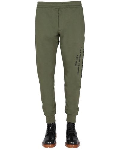 Alexander McQueen Jogging Trousers With Graffiti Logo - Green